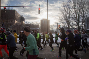 Participants in the Syracuse Half Marathon set off for their race at 7:53 a.m. last Sun., March 24. This year, 1,929 people ran the loop through downtown Syracuse.
